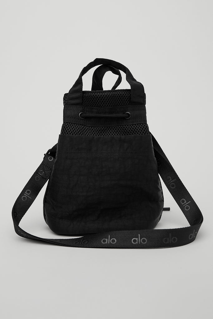 Olas Small crossbody bucket bag in Black/White - Aaluna